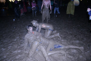 people mud wrestling